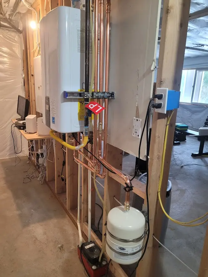 Licensed plumber repairing a kitchen sink in Marion