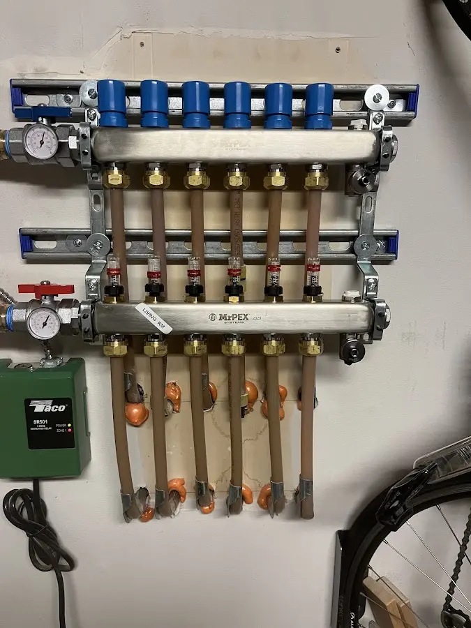 Plumber performing Water Heater Repair at a residential property in Marion